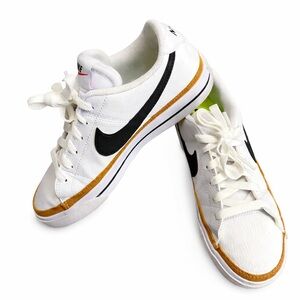 Nike White Sneakers with Black and Gold Details